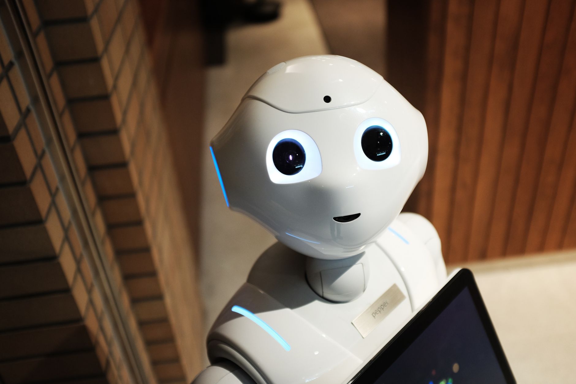 Futuristic humanoid robot representing automation in a modern setting